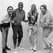 A group of men posing for a pictureDescription automatically generated