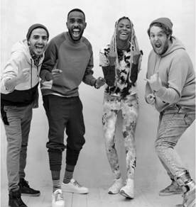 A group of men posing for a pictureDescription automatically generated