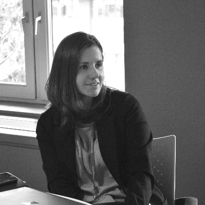 A person sitting at a deskDescription automatically generated